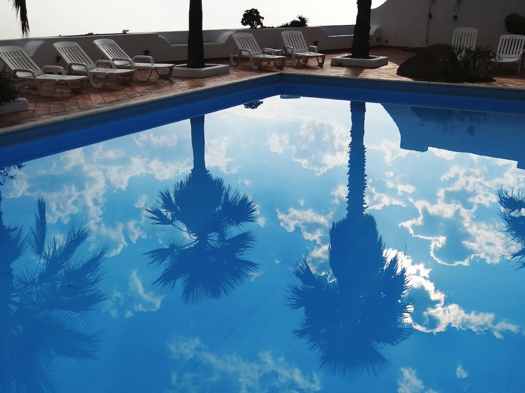Florida Climate’s Impact on Pool Debris and Maintenance Image